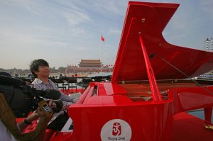 Lang Lang at a red piano